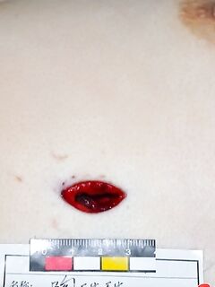 Chinese woman with a stabbed heart