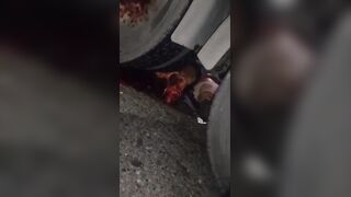Motorcyclist Crushed by truck wheel