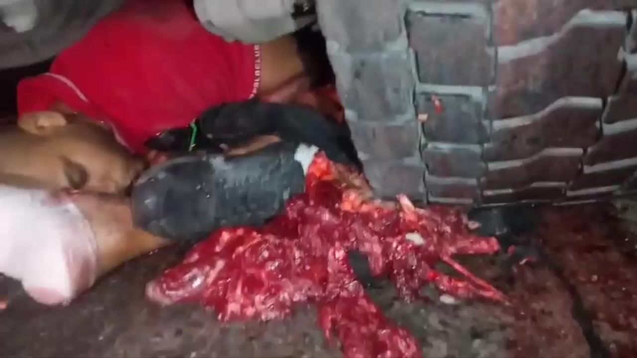 Motorcyclist Crushed by truck wheel