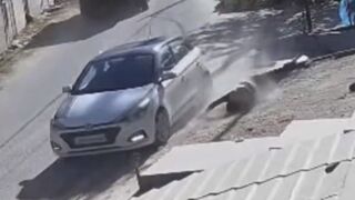 Man Sitting On The Roadside Struck By Car In India