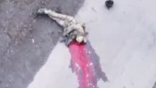 Ukrainian soldier blows his brainz out.