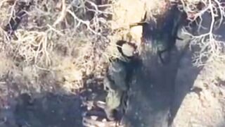 A grenade dropped from a drone landed directly on the head of a RU soldier