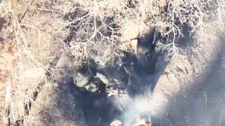 A grenade dropped from a drone landed directly on the head of a RU soldier