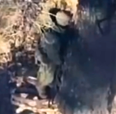 A grenade dropped from a drone landed directly on the head of a RU soldier