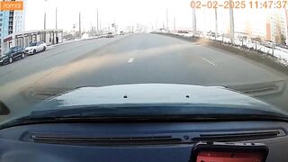 In Omsk, a driver was thrown from his car and nearly hit by another vehicle.
