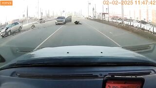 In Omsk, a driver was thrown from his car and nearly hit by another vehicle.