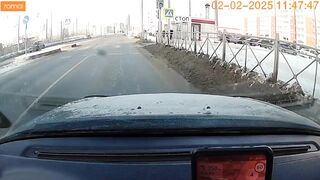 In Omsk, a driver was thrown from his car and nearly hit by another vehicle.