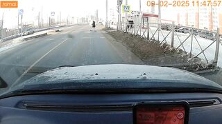 In Omsk, a driver was thrown from his car and nearly hit by another vehicle.