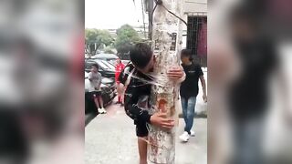 Captured Thief Tied To The Pole, Humiliated Before Police Arrest Him