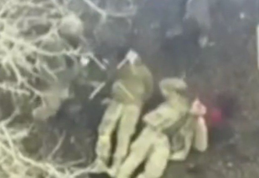 Executing 2 Ukrainian war criminals.