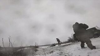 The drone arrives via a "bukhanka with" Orcs