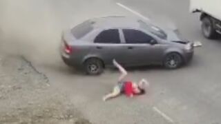Woman Standing On The Roadside Taken Out By Speeding Car