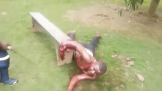 Black Man In Africa Getting His Arm Cut Off- [Old YNC video]