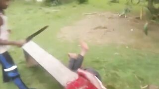 Black Man In Africa Getting His Arm Cut Off- [Old YNC video]