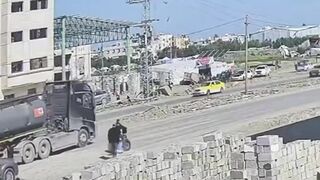 CCTV Captures The Moment an Israeli Drone Strikes Palestinian Civilians In Gaza