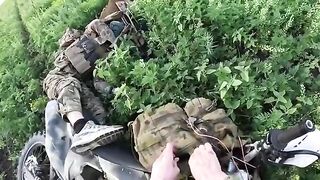 Pro-UA Chechen volunteer fighter shooting at, and killing Russian biker