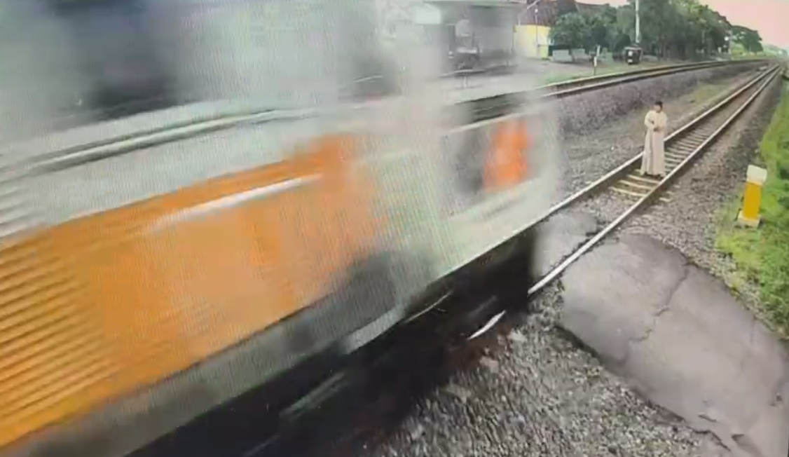 The Guy Stepped Onto The Track In Front Of The Approaching Train