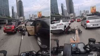 Shocking Moment Motorcyclist Runs Over Another Biker After He's Sent Flying by Toddle
