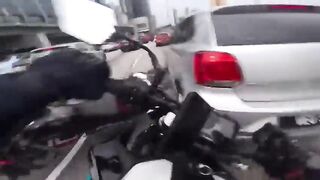 Shocking Moment Motorcyclist Runs Over Another Biker After He's Sent Flying by Toddle