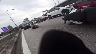 Shocking Moment Motorcyclist Runs Over Another Biker After He's Sent Flying by Toddle