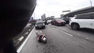 Shocking Moment Motorcyclist Runs Over Another Biker After He's Sent Flying by Toddle