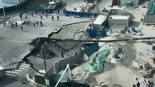 A massive sinkhole has swallowed a road in Shanghai