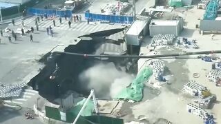 A massive sinkhole has swallowed a road in Shanghai