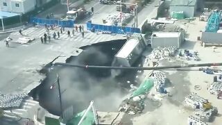 A massive sinkhole has swallowed a road in Shanghai