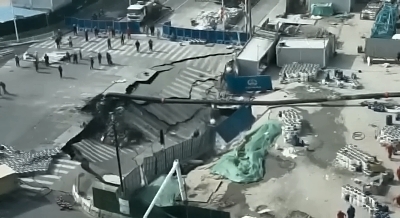 A massive sinkhole has swallowed a road in Shanghai