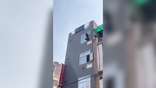 Crazy Woman Jumps Out Of A Hotel Window