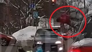 Delivery man does triple somersault after being hit by car