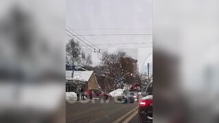Delivery man does triple somersault after being hit by car