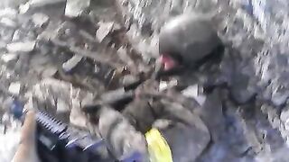 Dead soldiers after the massacre in the village of Georgievka