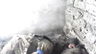 Dead soldiers after the massacre in the village of Georgievka