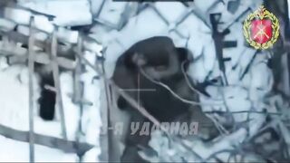 Colombian mercenary dies embracing his dead comrade.
