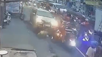 Cop  arrested after his multi-purpose vehicle  crashed into 14 bikes in Manila