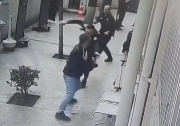 Turkish Man Steals Gun From Police Officer and Shoots Himself