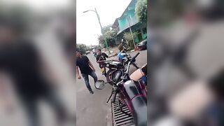 Angry Dude Headbutts Helpless Woman During Confrontation In Colombia