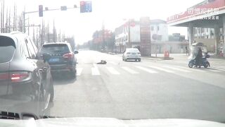 Dumb Moped Rider Pays The Price For Running On A Red Light
