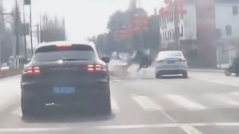 Dumb Moped Rider Pays The Price For Running On A Red Light