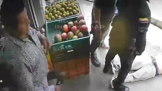 Sicario Wearing Helmet Takes Out Supermarket Customer In Colombia