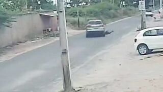 Man Jumps Under Moving Car And Gets Ragdolled