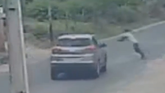 Man Jumps Under Moving Car And Gets Ragdolled