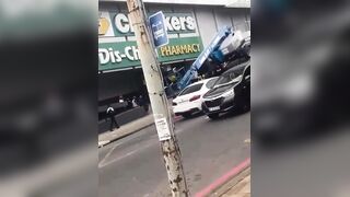 Cherry Picker Overturns Whilst Being Unloaded, Throwing Man Onto the Pavement (Dies)