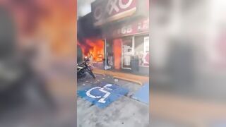 Woman Catches Fire After Cartel Set Store Ablaze