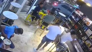 Assassins Open Fire at the Bar Entrance Killing One and Injuring Four