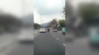Rider Hit By Car Door, And Ran Over By Another Two Wheeler