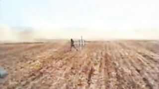 Israeli Merkava fires and runs over a Hamas fighter