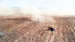 Israeli Merkava fires and runs over a Hamas fighter