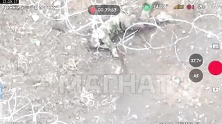A Russian soldier is trying to kill himself with barbed wire